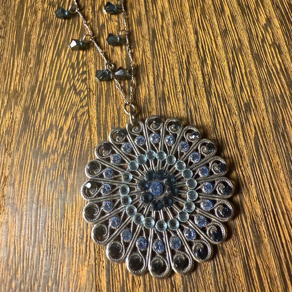 Intricate Silver and Blue Pendant Necklace